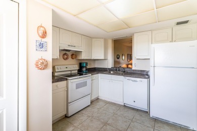 Spectacular lake views abound in this waterfront condominium on Marina Lakes Golf Course in Florida - for sale on GolfHomes.com, golf home, golf lot