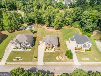 Experience elegance in this 2019-built, 5-bedroom, 3-bathroom on Crystal Lake Golf and Country Club in Georgia - for sale on GolfHomes.com, golf home, golf lot