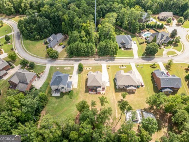 Experience elegance in this 2019-built, 5-bedroom, 3-bathroom on Crystal Lake Golf and Country Club in Georgia - for sale on GolfHomes.com, golf home, golf lot