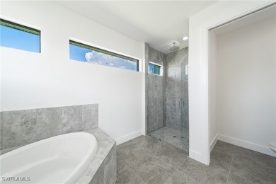 Newer home. 3 beds, 3.5 baths, and a 3-car garage. High 12' flat on Burnt Store Golf Club in Florida - for sale on GolfHomes.com, golf home, golf lot