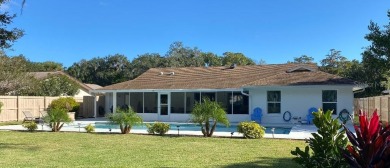 Pool home with golf course views and close to everything! New on Palm Harbor Golf Club in Florida - for sale on GolfHomes.com, golf home, golf lot