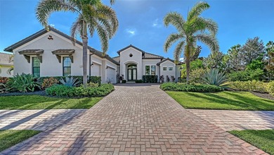 Set in Lakewood Ranch's Country Club East, this exceptional on Ritz-Carlton Members Golf Club in Florida - for sale on GolfHomes.com, golf home, golf lot