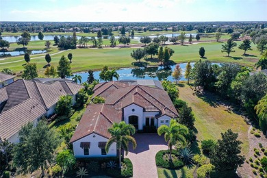 Set in Lakewood Ranch's Country Club East, this exceptional on Ritz-Carlton Members Golf Club in Florida - for sale on GolfHomes.com, golf home, golf lot