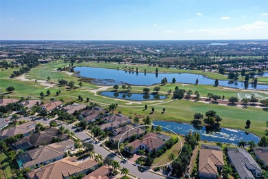 Set in Lakewood Ranch's Country Club East, this exceptional on Ritz-Carlton Members Golf Club in Florida - for sale on GolfHomes.com, golf home, golf lot