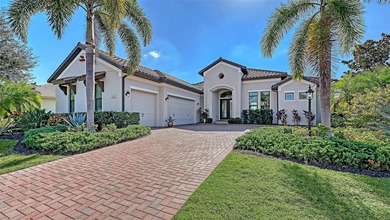 Set in Lakewood Ranch's Country Club East, this exceptional on Ritz-Carlton Members Golf Club in Florida - for sale on GolfHomes.com, golf home, golf lot