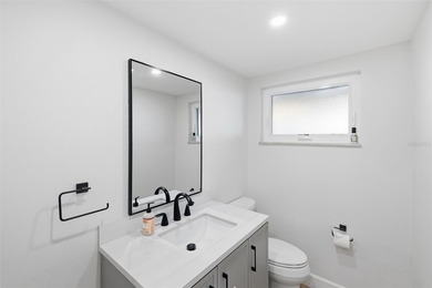 Beautifully remodeled two-story home in a sought-after Temple on Temple Terrace Golf and Country Club in Florida - for sale on GolfHomes.com, golf home, golf lot