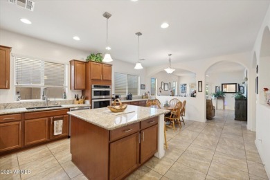 Welcome home to this immaculately kept three bedroom, two on The Golf Club At Johnson Ranch in Arizona - for sale on GolfHomes.com, golf home, golf lot