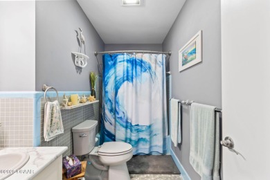 PRICED FOR A QUICK SALE! Charming Beachside Retreat with Modern on Oceanside Country Club in Florida - for sale on GolfHomes.com, golf home, golf lot