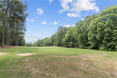 Recently appraised $695,000. Welcome to this stunning on Carolina Trace Country Club in North Carolina - for sale on GolfHomes.com, golf home, golf lot