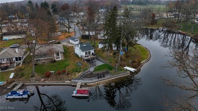 Experience the pinnacle of modern lakefront luxury. This on Turkeyfoot Lake Golf Links in Ohio - for sale on GolfHomes.com, golf home, golf lot