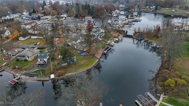 Experience the pinnacle of modern lakefront luxury. This on Turkeyfoot Lake Golf Links in Ohio - for sale on GolfHomes.com, golf home, golf lot
