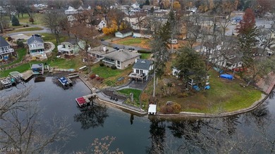 Experience the pinnacle of modern lakefront luxury. This on Turkeyfoot Lake Golf Links in Ohio - for sale on GolfHomes.com, golf home, golf lot