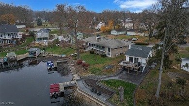 Experience the pinnacle of modern lakefront luxury. This on Turkeyfoot Lake Golf Links in Ohio - for sale on GolfHomes.com, golf home, golf lot