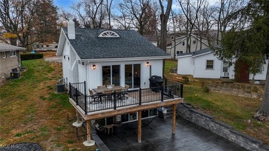 Experience the pinnacle of modern lakefront luxury. This on Turkeyfoot Lake Golf Links in Ohio - for sale on GolfHomes.com, golf home, golf lot