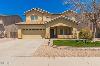 This spacious 5-bedroom home blends comfort, functionality, and on Wigwam Golf  Resort Litchfield Park  in Arizona - for sale on GolfHomes.com, golf home, golf lot