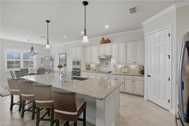 Step into this impeccably maintained, elegantly appointed estate on Bonita National Golf Course in Florida - for sale on GolfHomes.com, golf home, golf lot