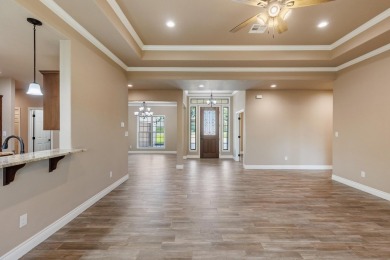 Stunning new construction in the gated Meadow Lakes Golf Club on Hidden Falls Golf Club in Texas - for sale on GolfHomes.com, golf home, golf lot