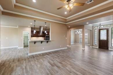 Stunning new construction in the gated Meadow Lakes Golf Club on Hidden Falls Golf Club in Texas - for sale on GolfHomes.com, golf home, golf lot
