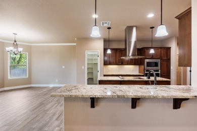 Stunning new construction in the gated Meadow Lakes Golf Club on Hidden Falls Golf Club in Texas - for sale on GolfHomes.com, golf home, golf lot