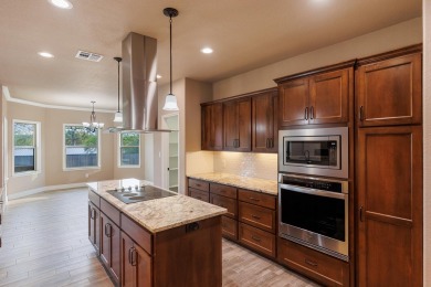 Stunning new construction in the gated Meadow Lakes Golf Club on Hidden Falls Golf Club in Texas - for sale on GolfHomes.com, golf home, golf lot