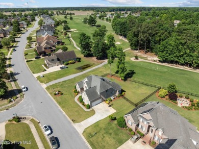 Well appointed with a view of the 11th tee box is this 5 bedroom on Ironwood Golf and Country Club in North Carolina - for sale on GolfHomes.com, golf home, golf lot
