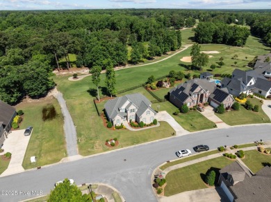 Well appointed with a view of the 11th tee box is this 5 bedroom on Ironwood Golf and Country Club in North Carolina - for sale on GolfHomes.com, golf home, golf lot
