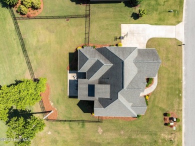 Well appointed with a view of the 11th tee box is this 5 bedroom on Ironwood Golf and Country Club in North Carolina - for sale on GolfHomes.com, golf home, golf lot