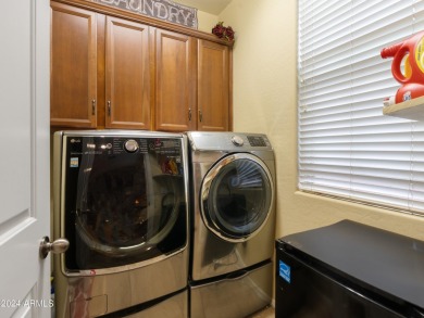 Located in Verrado's Main Street District with OWNED SOLAR & A on Verrado Golf Club  in Arizona - for sale on GolfHomes.com, golf home, golf lot