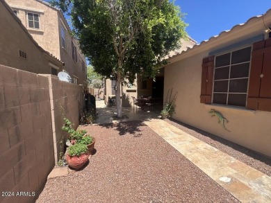 Located in Verrado's Main Street District with OWNED SOLAR & A on Verrado Golf Club  in Arizona - for sale on GolfHomes.com, golf home, golf lot