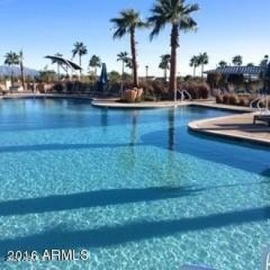 Located in Verrado's Main Street District with OWNED SOLAR & A on Verrado Golf Club  in Arizona - for sale on GolfHomes.com, golf home, golf lot