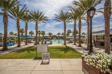 Located in Verrado's Main Street District with OWNED SOLAR & A on Verrado Golf Club  in Arizona - for sale on GolfHomes.com, golf home, golf lot