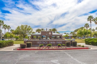 Located in Verrado's Main Street District with OWNED SOLAR & A on Verrado Golf Club  in Arizona - for sale on GolfHomes.com, golf home, golf lot