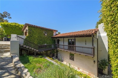 Indulge in the elegance and Spanish-style charm of this on Palos Verdes Golf Club in California - for sale on GolfHomes.com, golf home, golf lot