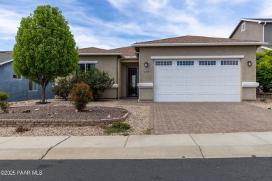 Nestled in Quailwood Meadows, this lovely & well-appointed on Quail Wood Greens Golf Course in Arizona - for sale on GolfHomes.com, golf home, golf lot