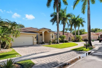 *WOW* AMAZING BRIGHT & SPACIOUS REMODELED 5 BEDROOM/3 FULL BATHS on Weston Hills Country Club in Florida - for sale on GolfHomes.com, golf home, golf lot