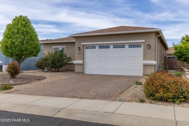 Nestled in Quailwood Meadows, this lovely & well-appointed on Quail Wood Greens Golf Course in Arizona - for sale on GolfHomes.com, golf home, golf lot