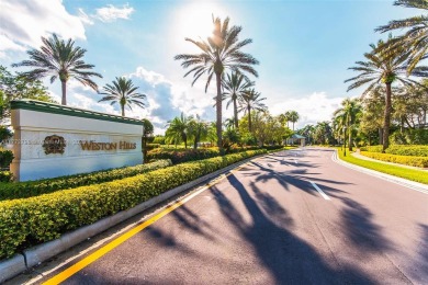 *WOW* AMAZING BRIGHT & SPACIOUS REMODELED 5 BEDROOM/3 FULL BATHS on Weston Hills Country Club in Florida - for sale on GolfHomes.com, golf home, golf lot