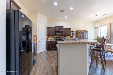 Nestled in Quailwood Meadows, this lovely & well-appointed on Quail Wood Greens Golf Course in Arizona - for sale on GolfHomes.com, golf home, golf lot