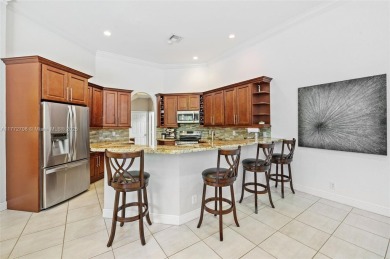 *WOW* AMAZING BRIGHT & SPACIOUS REMODELED 5 BEDROOM/3 FULL BATHS on Weston Hills Country Club in Florida - for sale on GolfHomes.com, golf home, golf lot