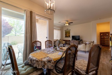 Nestled in Quailwood Meadows, this lovely & well-appointed on Quail Wood Greens Golf Course in Arizona - for sale on GolfHomes.com, golf home, golf lot