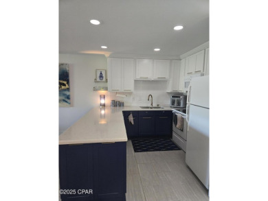 This is the perfect condo in the gated community of Bay Point on Bay Point Resort Golf Club in Florida - for sale on GolfHomes.com, golf home, golf lot
