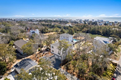 Time to reset your soul when you step inside this stunning home on Founders Club At St. James Plantation in North Carolina - for sale on GolfHomes.com, golf home, golf lot