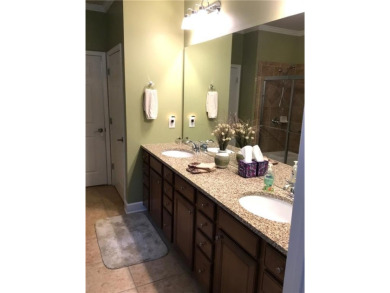 This stunning ranch-style craftsman home is situated on a on Reunion Golf Club in Georgia - for sale on GolfHomes.com, golf home, golf lot