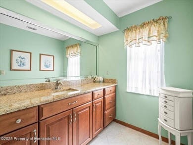 Located in Glen Lakes, this 1990 Alexander Boca Grande Deluxe on Glen Lakes Country Club in Florida - for sale on GolfHomes.com, golf home, golf lot