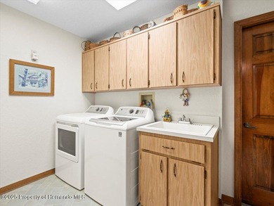 Located in Glen Lakes, this 1990 Alexander Boca Grande Deluxe on Glen Lakes Country Club in Florida - for sale on GolfHomes.com, golf home, golf lot