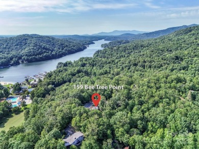 Located behind the gates, and a short golf cart ride to all on Rumbling Bald Resort on Lake Lure in North Carolina - for sale on GolfHomes.com, golf home, golf lot