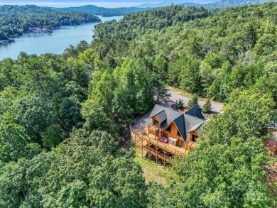 Classic log cabin, conveniently located behind the gates of on Rumbling Bald Resort on Lake Lure in North Carolina - for sale on GolfHomes.com, golf home, golf lot