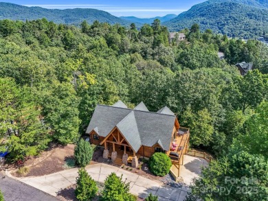 Classic log cabin, conveniently located behind the gates of on Rumbling Bald Resort on Lake Lure in North Carolina - for sale on GolfHomes.com, golf home, golf lot