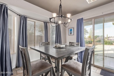 Nestled in the desirable Villages of Queen Creek, this home on Las Colinas Golf Club in Arizona - for sale on GolfHomes.com, golf home, golf lot