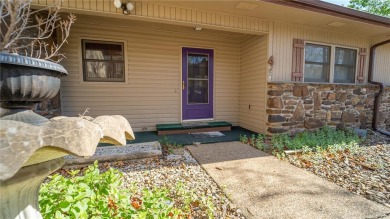 Nestled in the heart of Bella Vista, this charming townhouse on Bella Vista Country Club - Berksdale in Arkansas - for sale on GolfHomes.com, golf home, golf lot